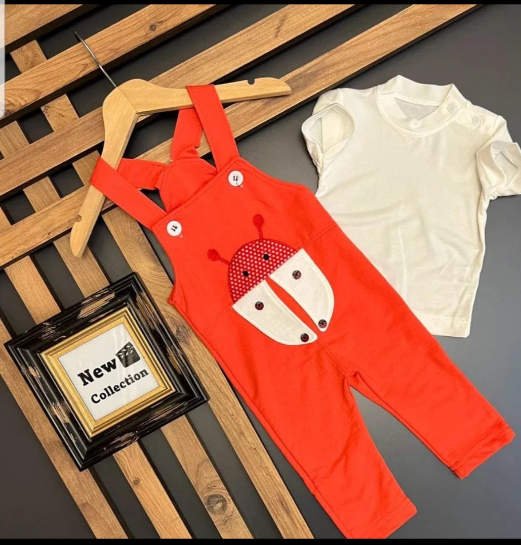 Children's costume with red suit and white shirt