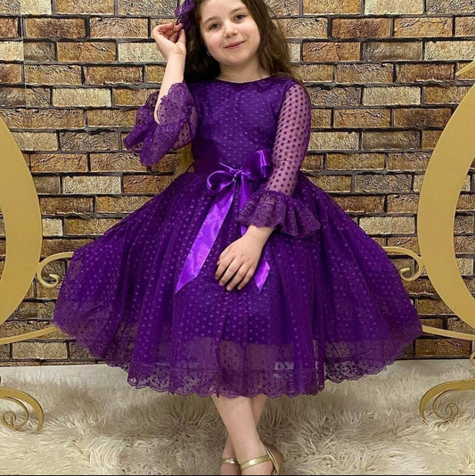 Elegant girls' dress in purple with polka dots
